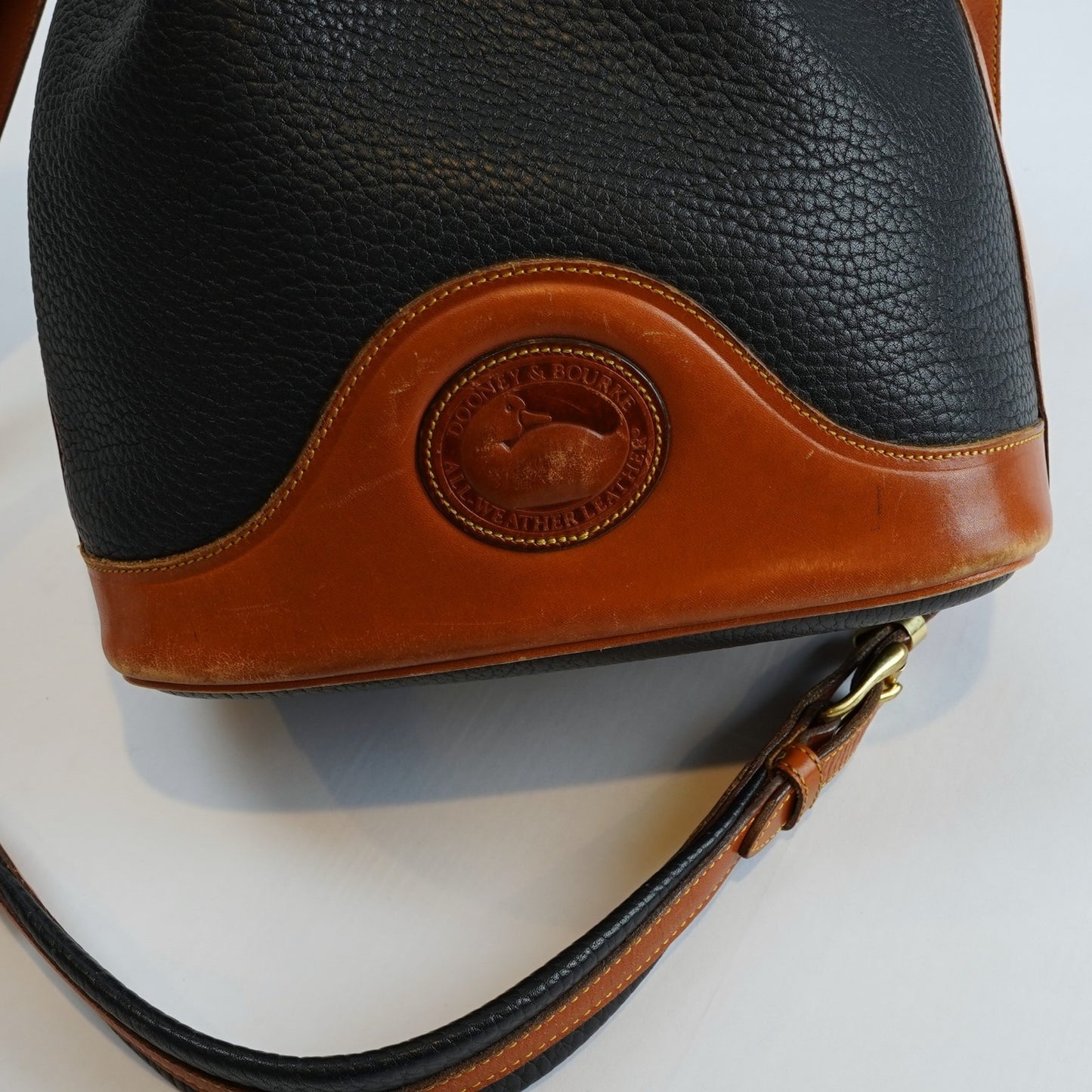 Dooney & Bourke Vintage Drawstring Bucket Bag Navy Brown Leather