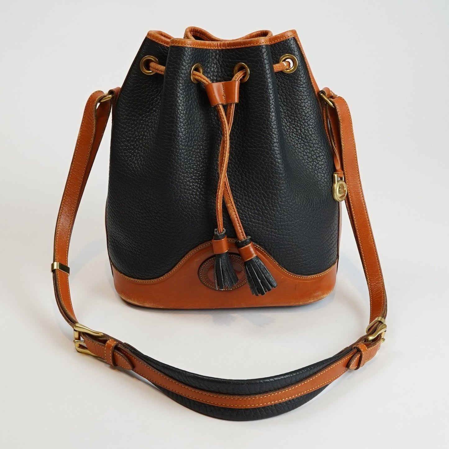 Dooney & Bourke Vintage Drawstring Bucket Bag Navy Brown Leather