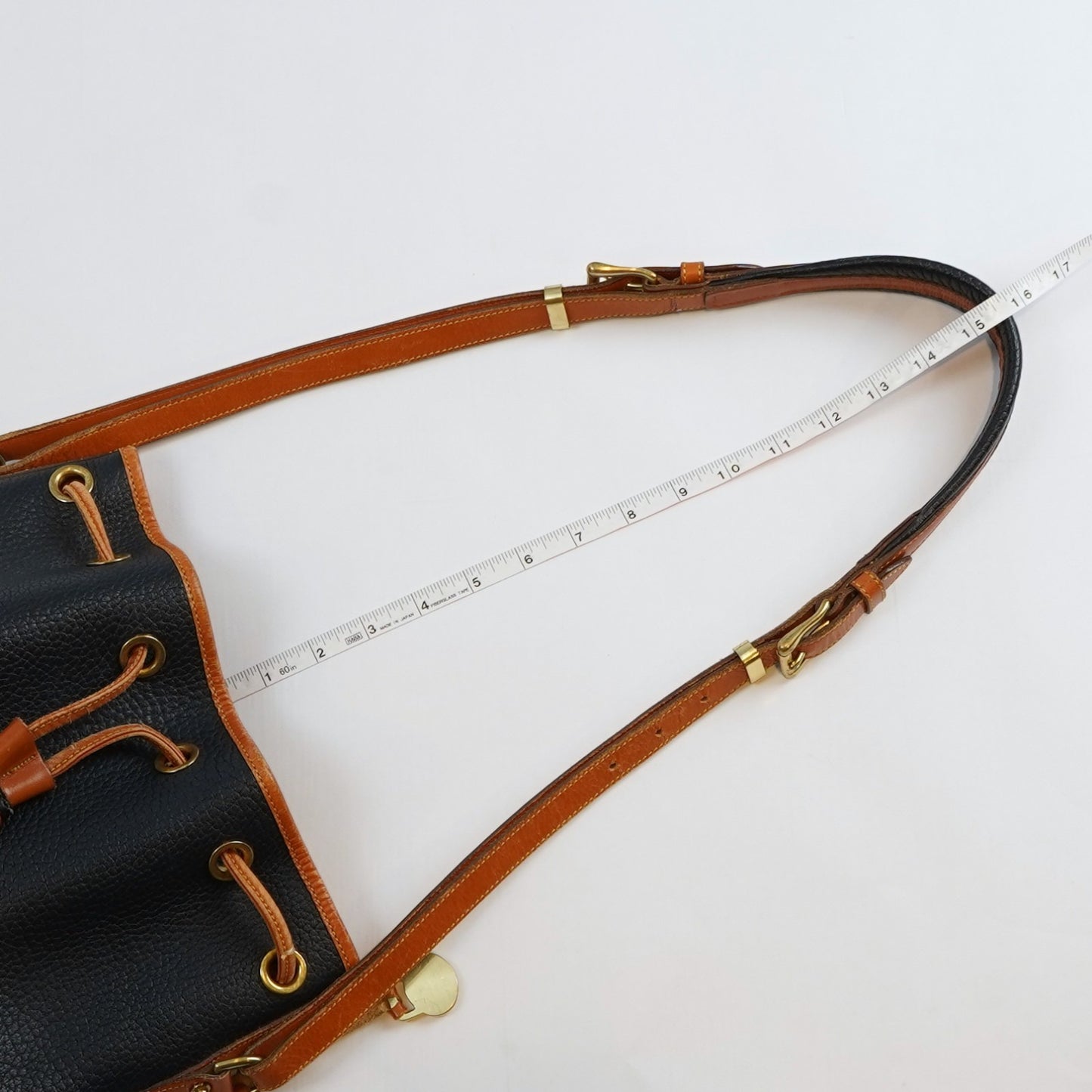 Dooney & Bourke Vintage Drawstring Bucket Bag Navy Brown Leather