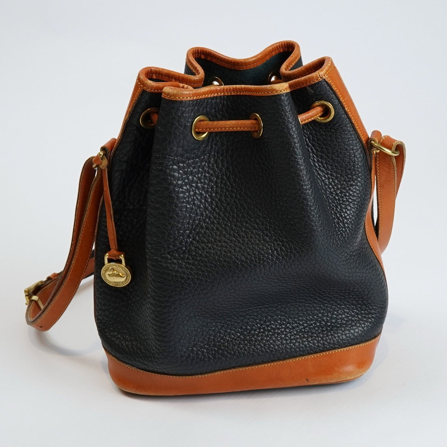 Dooney & Bourke Vintage Drawstring Bucket Bag Navy Brown Leather